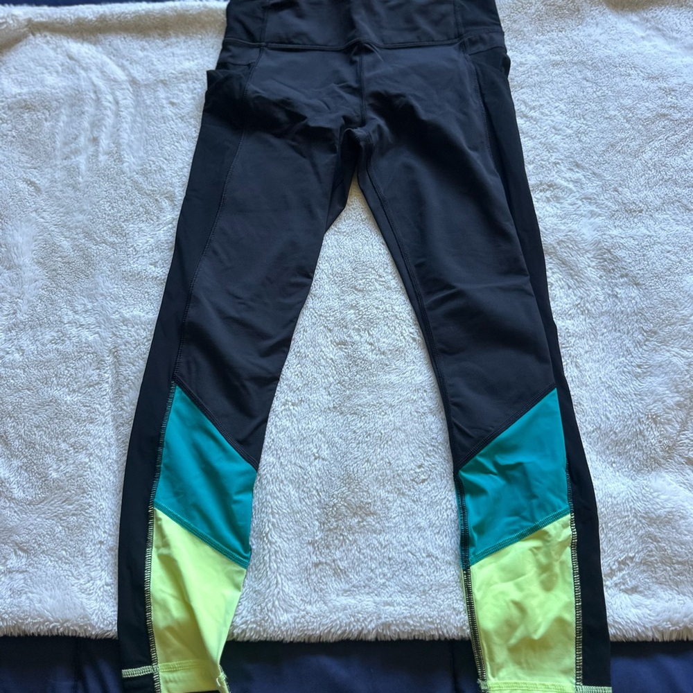 Lululemon Athletica Black, Teal, and Yellow Leggings